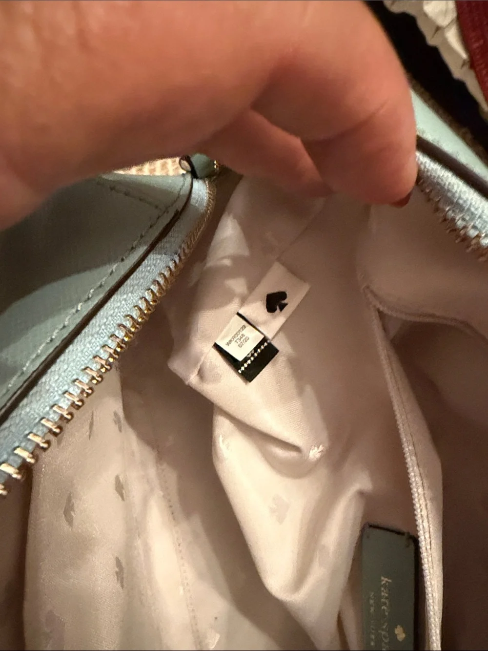 Kate Spade Devyn Medium Duffel Bag in the color Frosted Spearmint, featuring